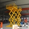 Elevador de tijeras hidráulico estacionario estable y seguro para el transporte de carga