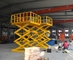 Elevador de tijeras hidráulico estacionario estable y seguro para el transporte de carga